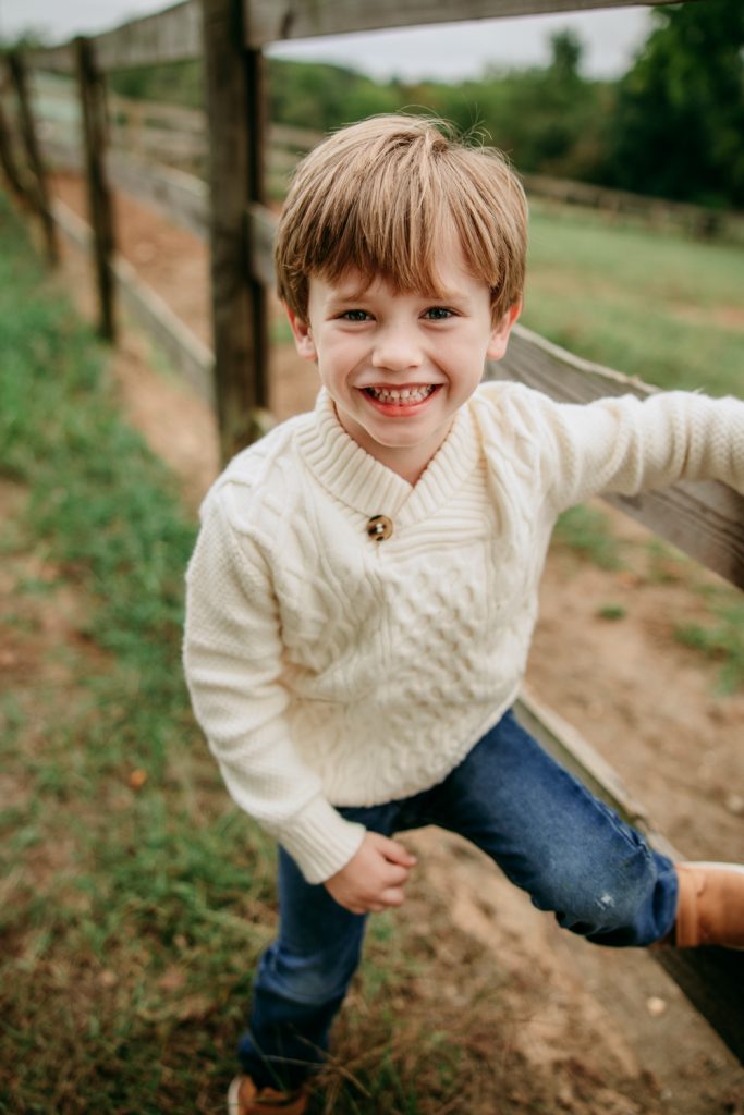 cute boy smiling during Tanglewood park family photo session