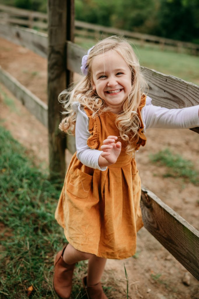 cute girl smiling during Tanglewood park family photo session
