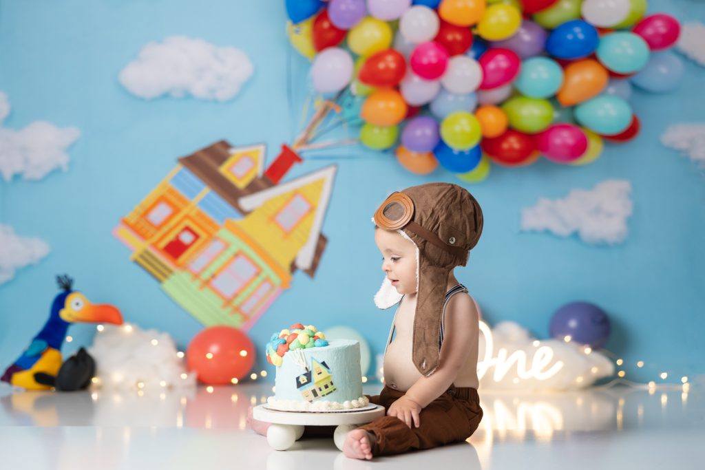 Baby-russel-Up-movie-cake-smash-photo-session-first-birthday-triad-baby-photo-studio